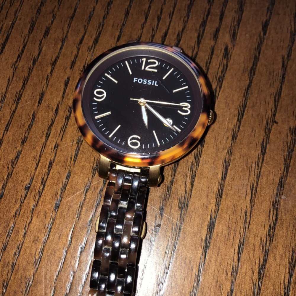 Brown and Black Fossil watch